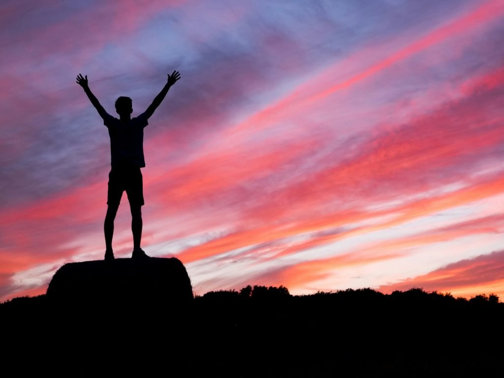 Person holding up their arms for an article on achieving IoT success as the technology promised many advantages to customers, but for many of us, the only success has been a drawer full of useless gimmicks.