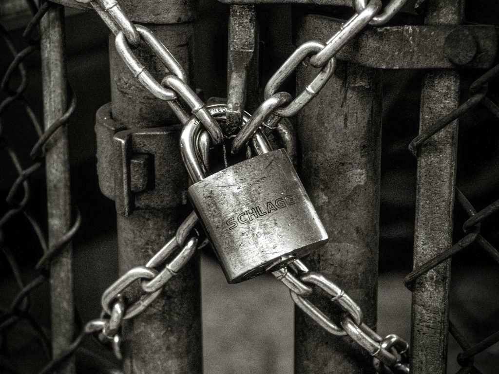 Security padlock as, for enterprise leaders, the integration of mobile, IoT, and Operational Technology (OT) systems has become a double-edged sword.
